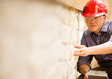 inspecting a foundation repair in Washington